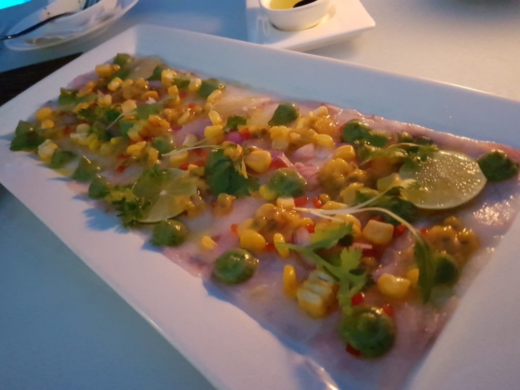 Barramundi ceviche - served with avocado, coriander, shallots, chilli, lime and passion fruit dressing