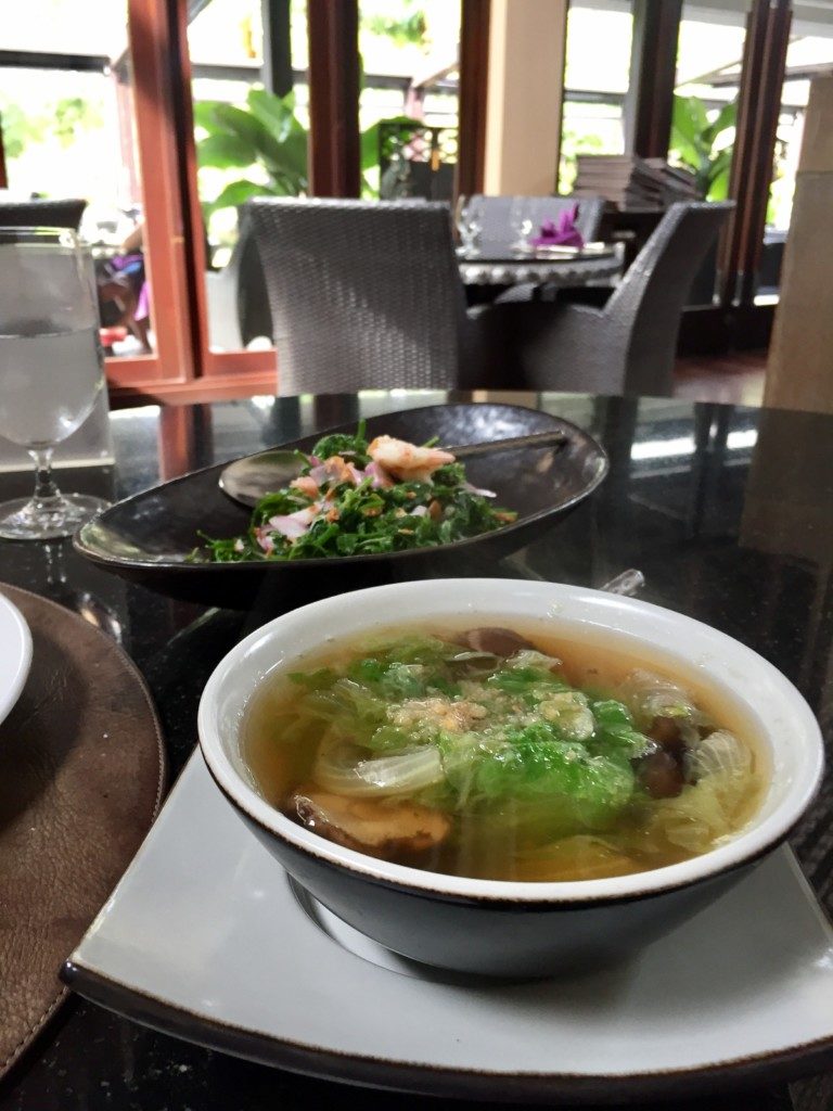 Clear soup with mixed vegetables and mushrooms