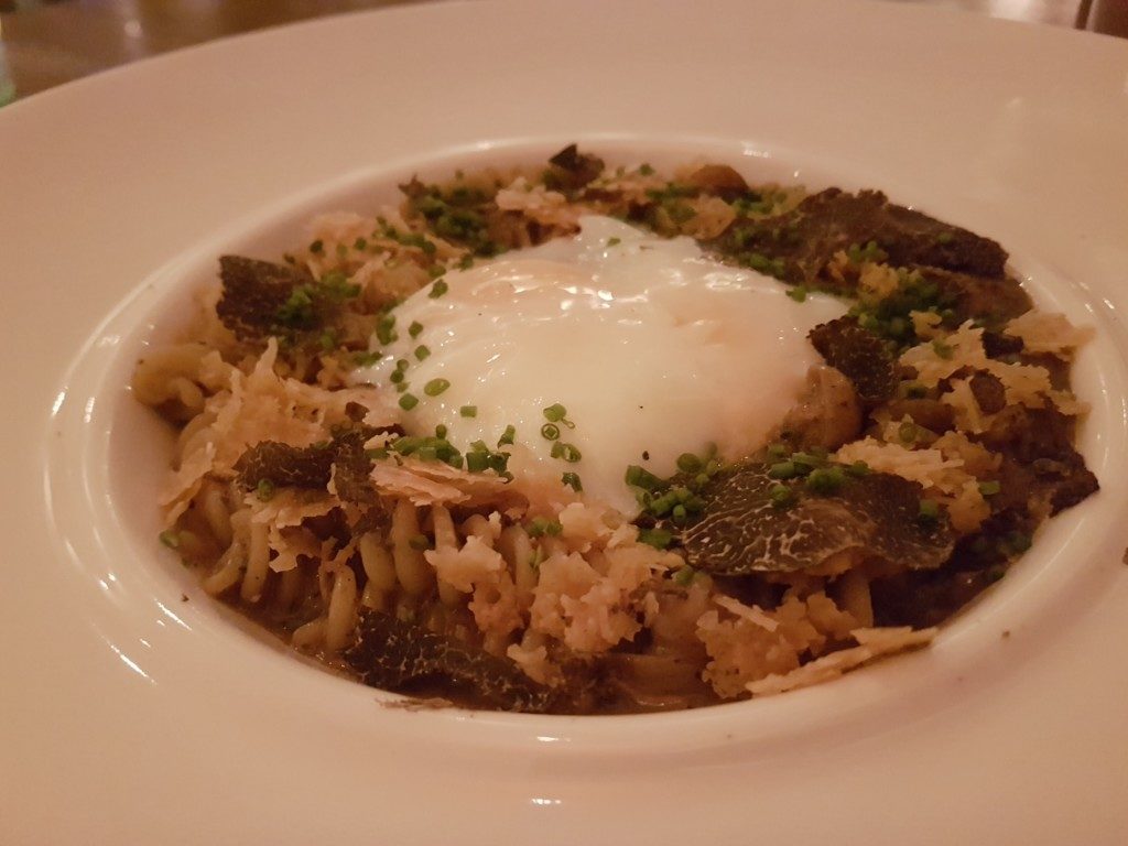 Truffle fusili with truffle light cream and Onsen egg.