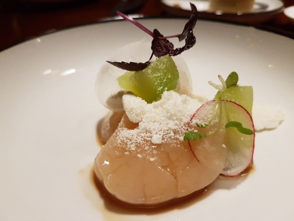 fresh sea bass with langoustine, celery roots, radishes and top with ice shaved horse-radish.