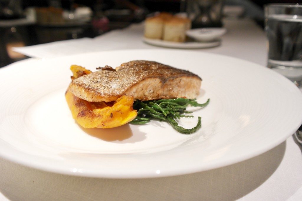 Pan-seared Salmon Fillet with Herb-marinated Sea Asparagus, Sweet and Sour Baked Pumpkin, and Golden Raisins.